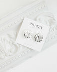 Auskarai BIG SILVER WAVY STUDS