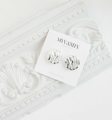 Auskarai BIG SILVER WAVY STUDS